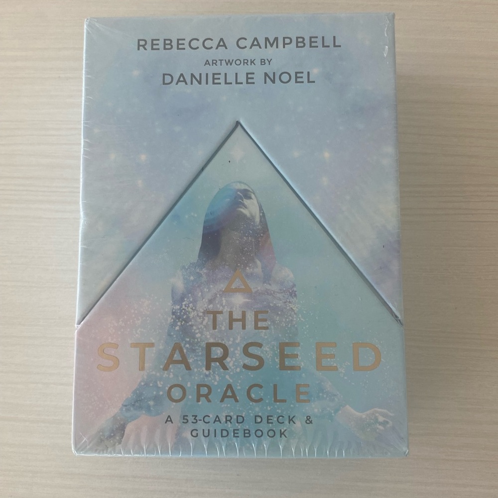 The Starseed Oracle 53 card deck and guidebook by Rebecca Campbell.